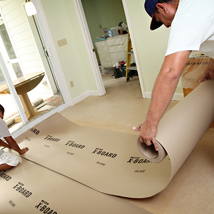 Lay Out X•Board for Durable Floor Protection