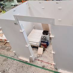 White wooden construction using a wall system kit