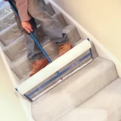 installing carpet protective film with applicator