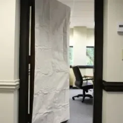Canvas door jacket on door in office