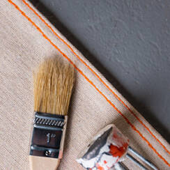 orange stitching on slip resistant drop cloth